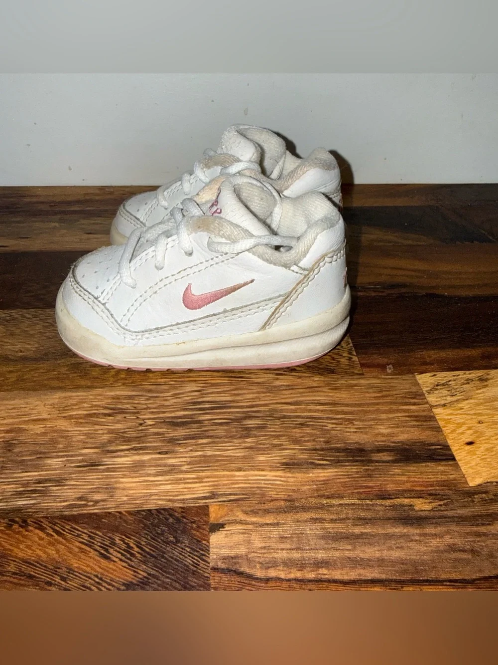 Y2K Nike Kids White Leather Sneakers with Pink Swoosh Accent